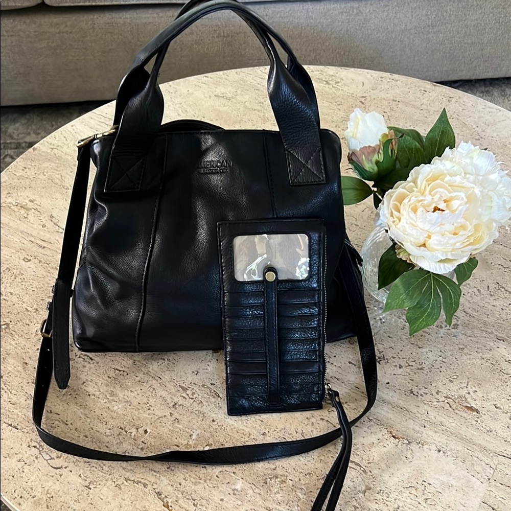 Black Leather Shoulder Bag with Structured Design with Wristlet.